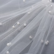 Voile de mariée ivoire court avec perles 