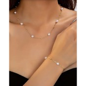 Parure de mari�e dor� avec perles, collier + bracelet