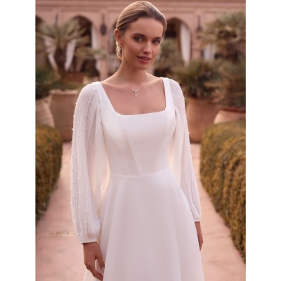 Manches de robes de mariée ivoires en mousseline perlée 