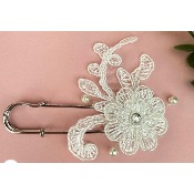 Attache-traîne de mariage artisanal en dentelle et perles